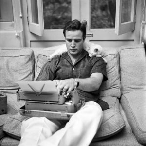 marlonbrandowithhiscatathomecirca1950s1